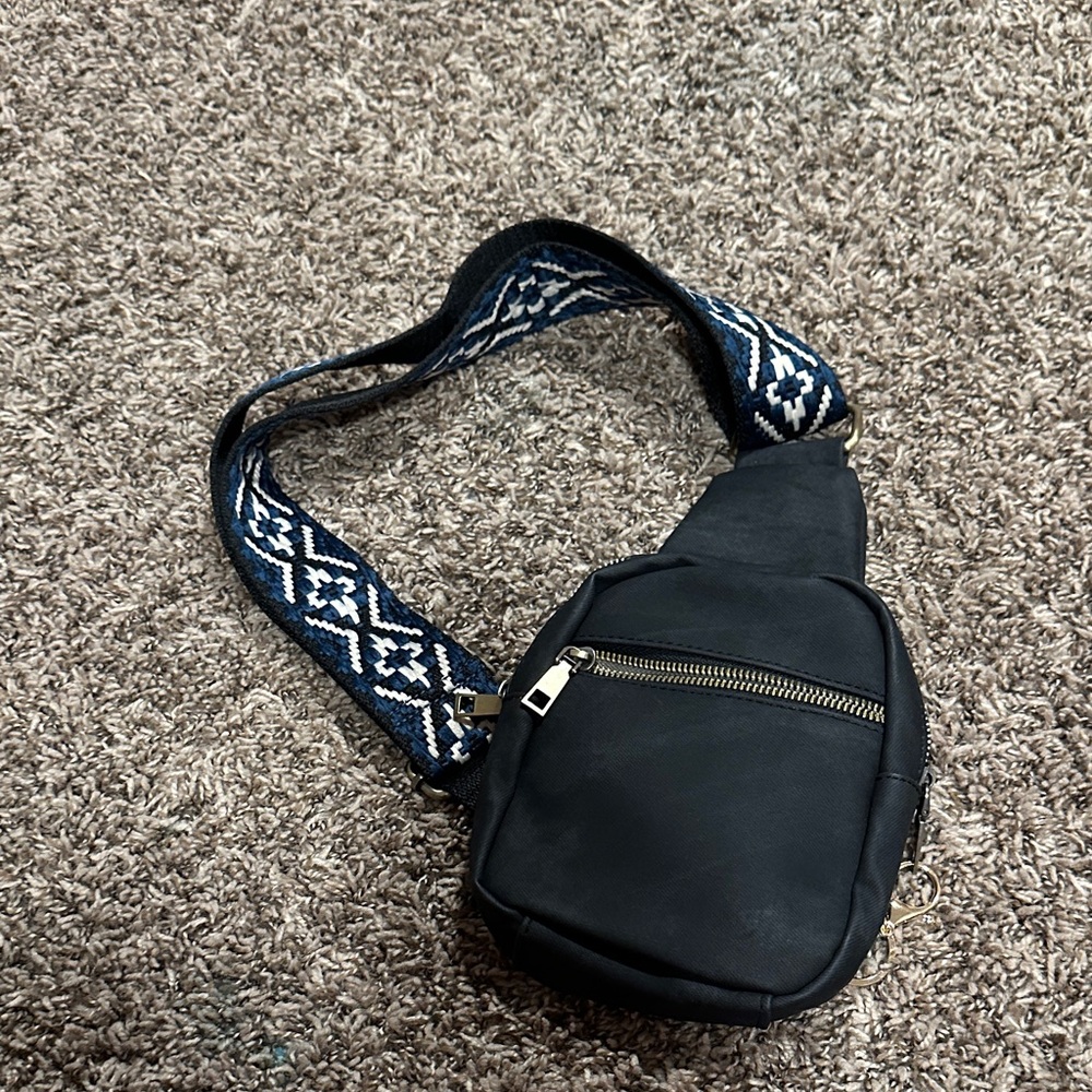 Stylish Black Crossbody Bag with Patterned Strap